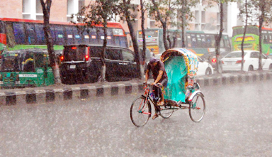 Severe traffic snarl occurs in different city roads due to rain on Tuesday afternoon. The snap was taken from Shahbag area.