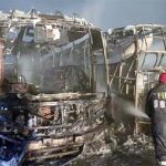 A fire gutted 14 Volvo buses of London Express Paribahan parked in a garage at Dhaka's Demra on Monday evening.