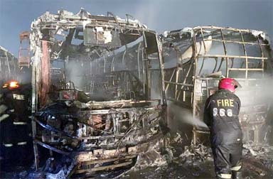 A fire gutted 14 Volvo buses of London Express Paribahan parked in a garage at Dhaka's Demra on Monday evening.