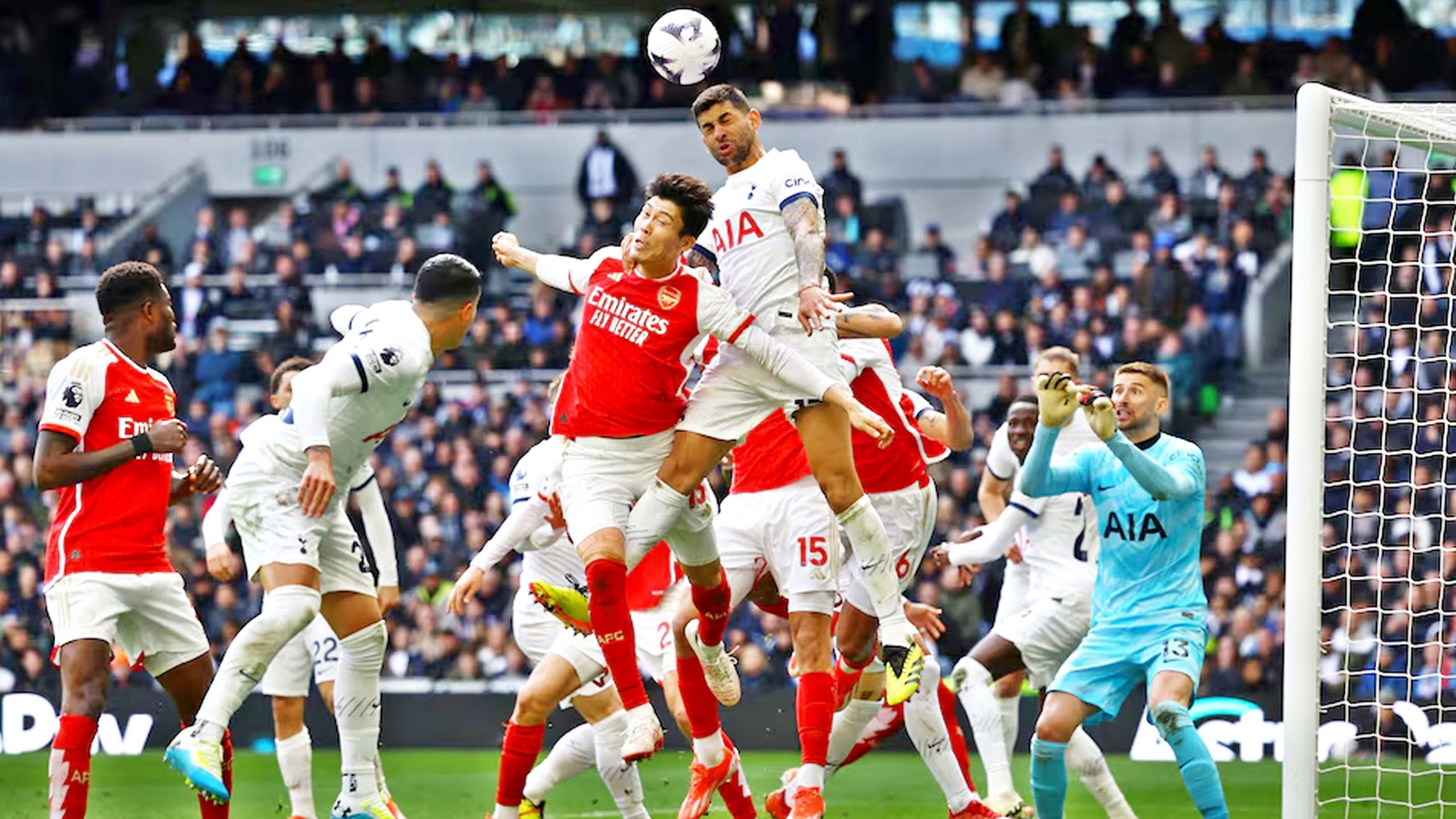 Arsenal's Takehiro Tomiyasu in action with Tottenham Hotspur's Cristian Romero in the Premier League match against Tottenham Hotspur.