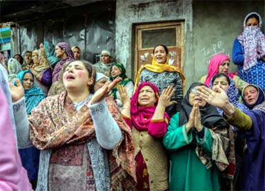 Family members and relatives cry after the boat capsized in Jhelum River.