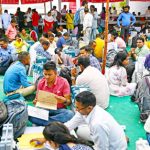 Election officials make preparations after collecting Electronic Voting Machines from a polling materials distribution centre in Haridwar on Thursday, on the eve of phase one of India’s general election.