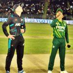 Pakistan’s captain Babar Azam (R) and his New Zealand counterpart Michael Bracewell watch the coin during the toss before the start of the second Twenty20 international (T20I) cricket match between Pakistan and New Zealand at the Pindi Cricket Stadium in Rawalpindi on April 20, 2024.