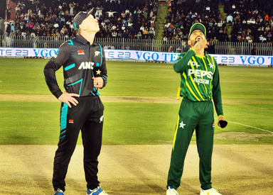 Pakistan’s captain Babar Azam (R) and his New Zealand counterpart Michael Bracewell watch the coin during the toss before the start of the second Twenty20 international (T20I) cricket match between Pakistan and New Zealand at the Pindi Cricket Stadium in Rawalpindi on April 20, 2024.