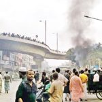 Drivers of battery-run three wheelers set a police box on fire at Kalshi intersection in the city's Mirpur area on Sunday.