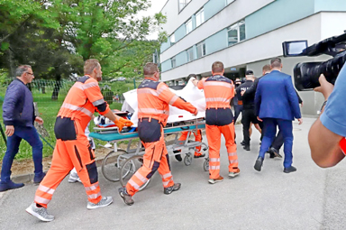 Robert Fico is transported into a hospital in the town of Banska Bystrica after he was wounded in a shooting.