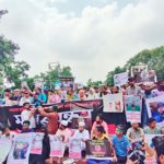 Members of the families of those killed during the student movement hold a rally at the Central Shaheed Minar on Wednesday