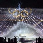 The Olympic rings are raised during the closing ceremony at the Stade de France on Sunday, August 11.