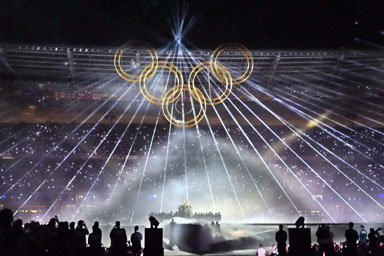 The Olympic rings are raised during the closing ceremony at the Stade de France on Sunday, August 11.